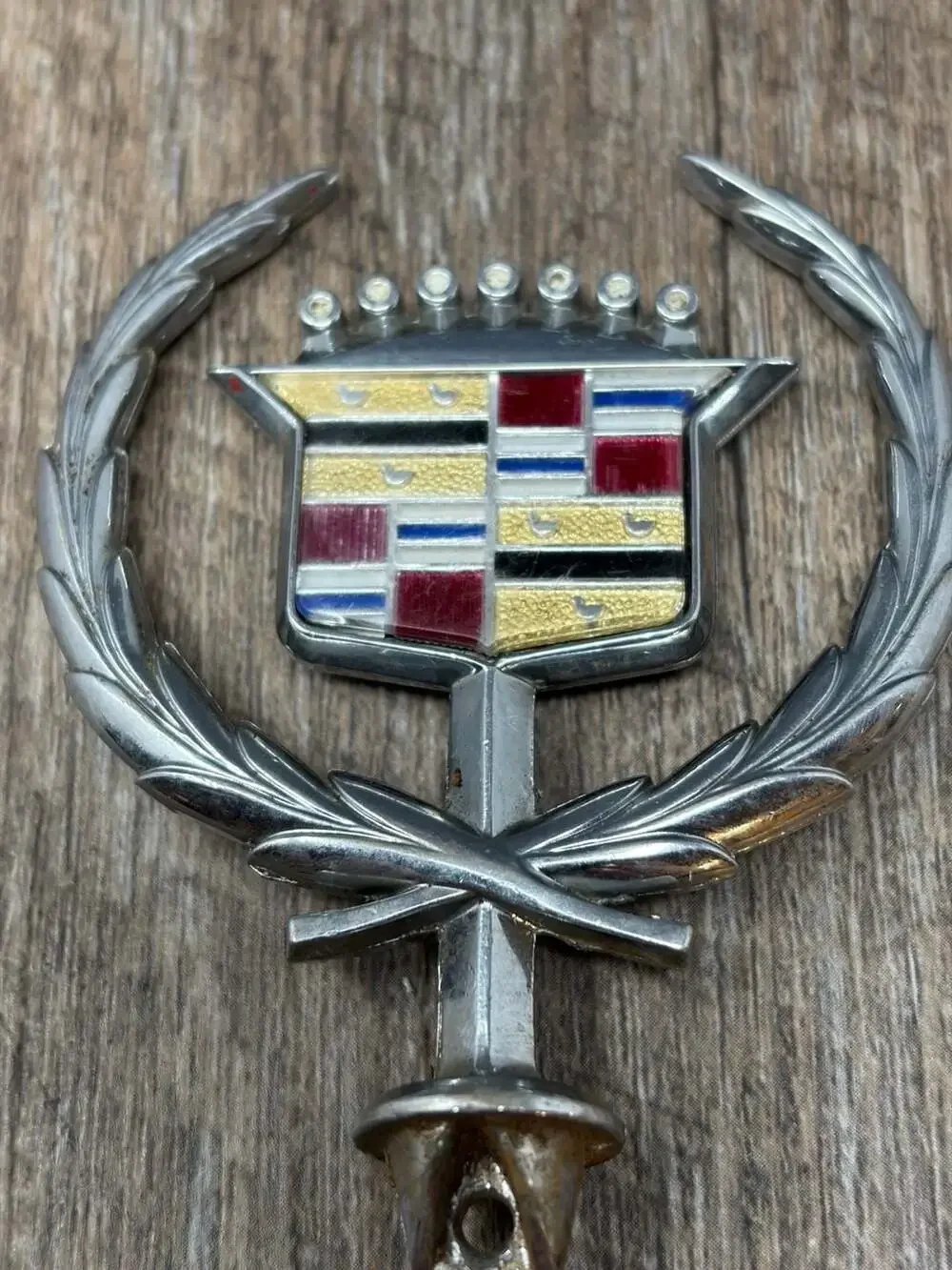 Vintage Iconic GM Cadillac crest and wreath hood ornament emblem with gold birds